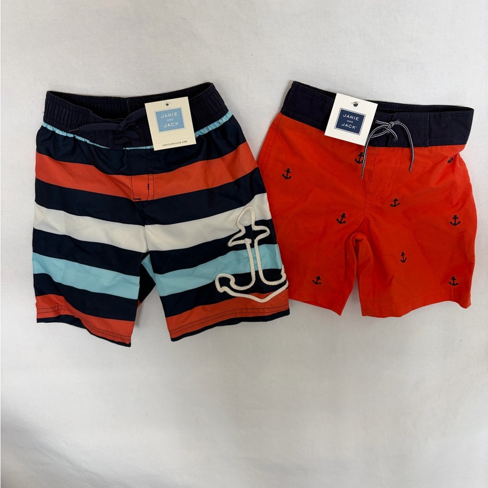 NWT JANIE AND JACK SWIM TRUNKS.Striped Pair is Size 4.Orange Pair is Size 2t.